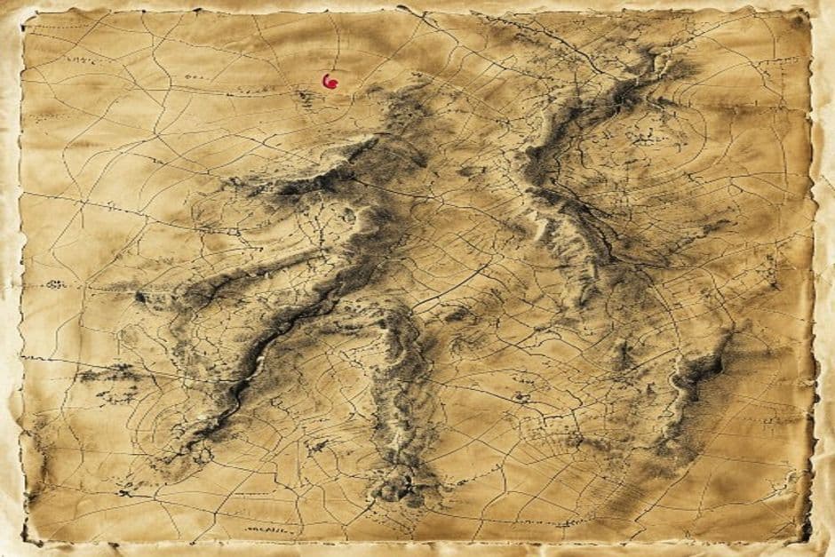 A vintage topographical map fragment with a single red ink mark.